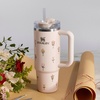 image:imageSTANLEY Quencher H20 Tumbler with Handle and Straw 40 oz  Flowstate 3Position Lid  Cup Holder Compatible for Travel  Insulated Stainless Steel Cup  BPAFree  Blue Dream StoneRose Quartz Bouquets